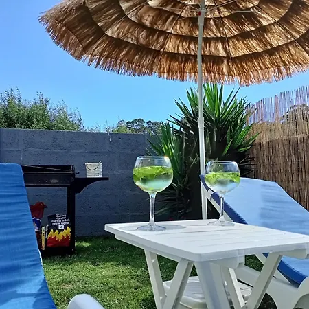Playa, Jardin Y Piscina En Cabo Udra Feriehus